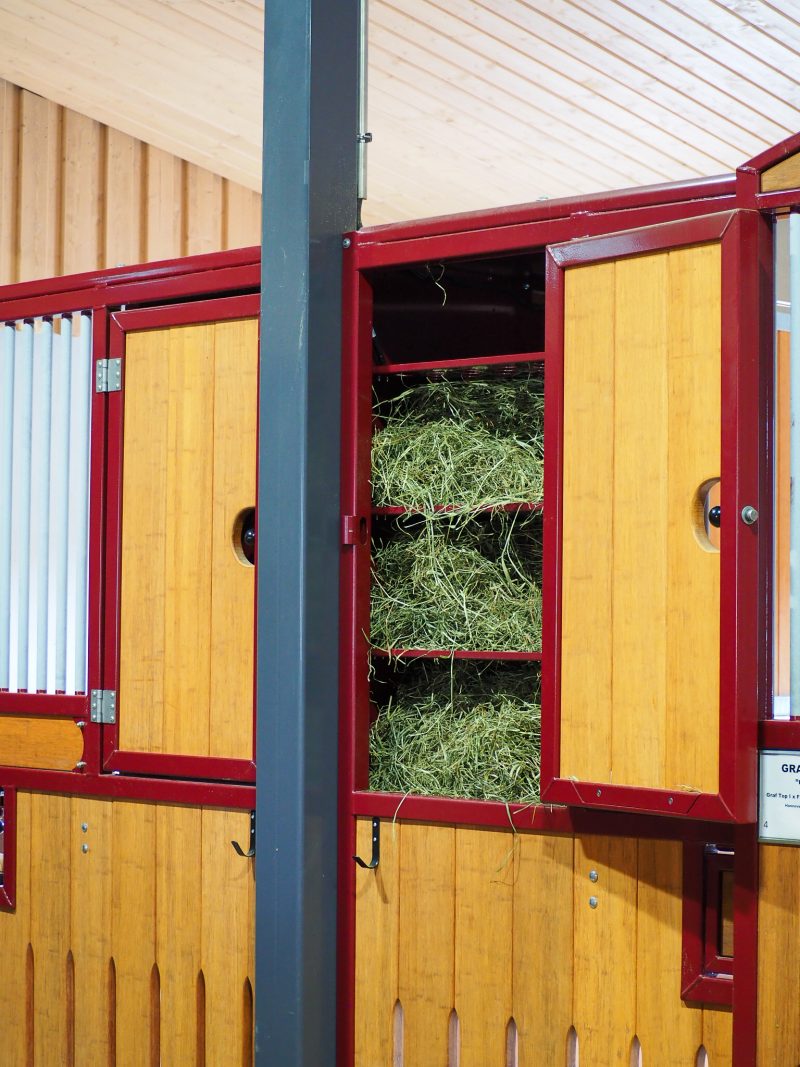 Fresh hay portioned behind the timed door